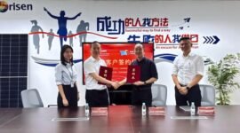 Photo&nbsp;of&nbsp;the&nbsp;two&nbsp;parties&nbsp;signing&nbsp;the&nbsp;agreement